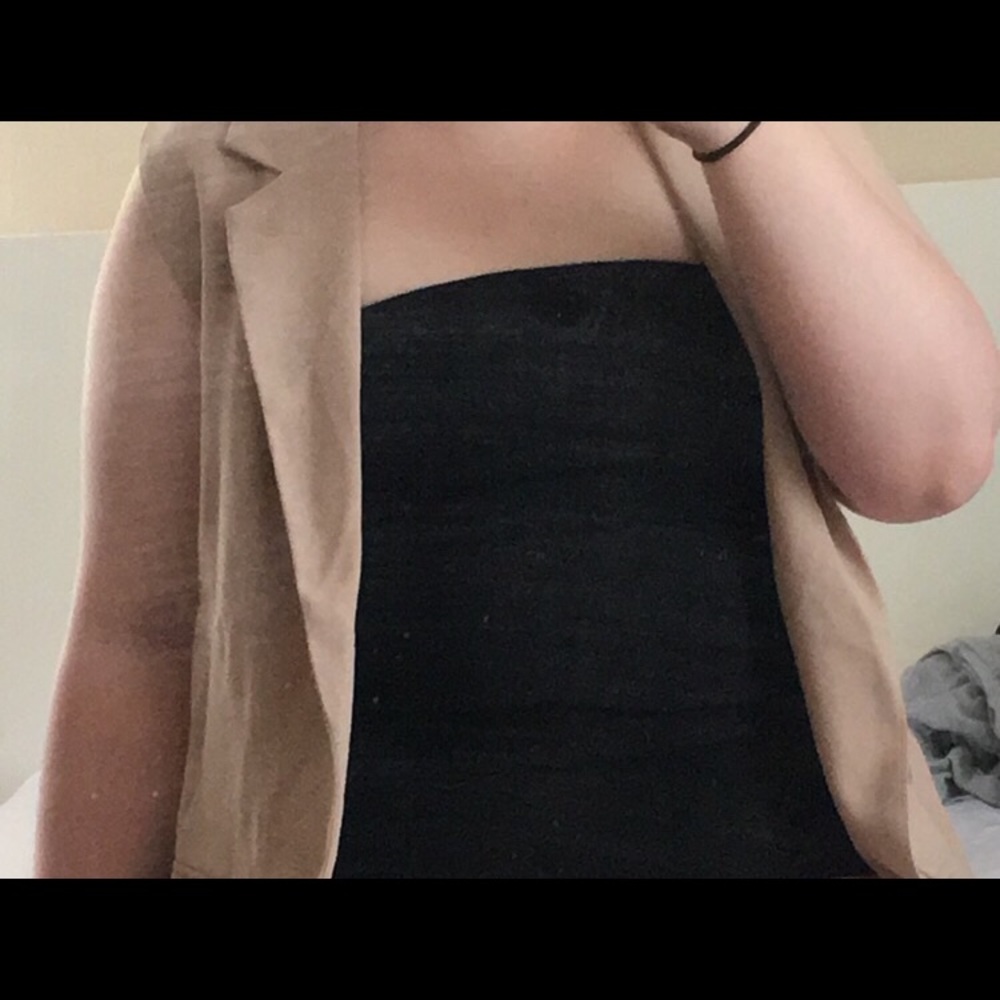 Sleeveless duster coat